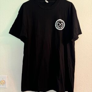 Men’s Dixxon shirt size large. Minor cracking on back image. GUC